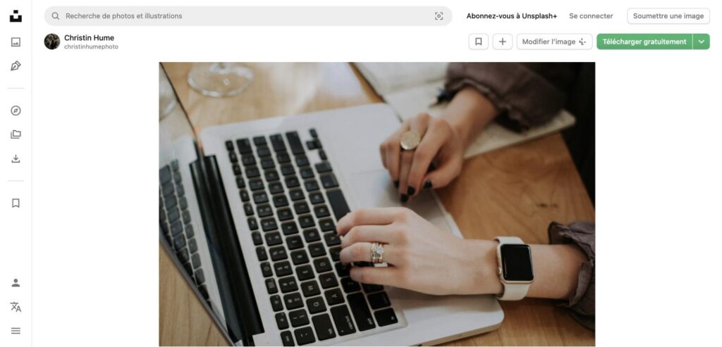 best AI tools for freelance writers - woman typing on MacBook laptop